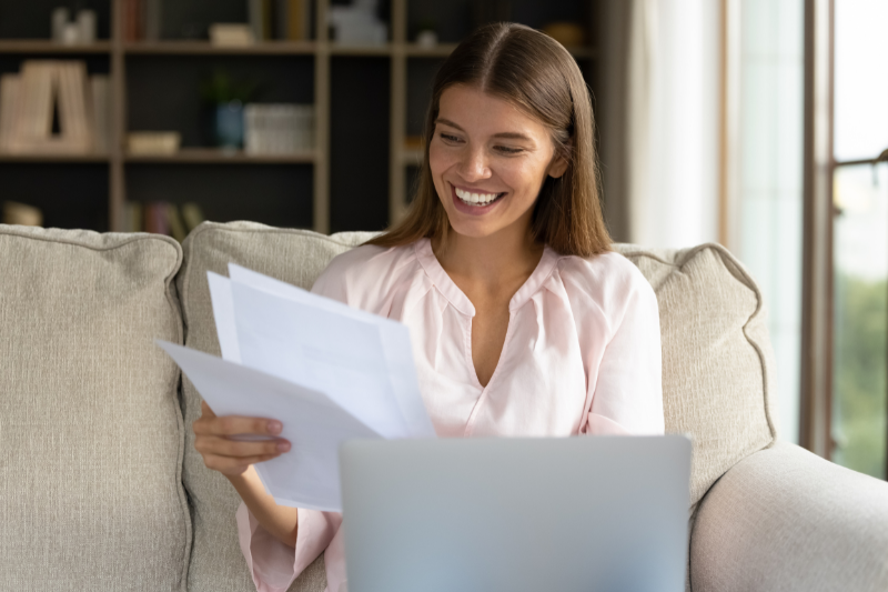 Woman looking at her bank statement